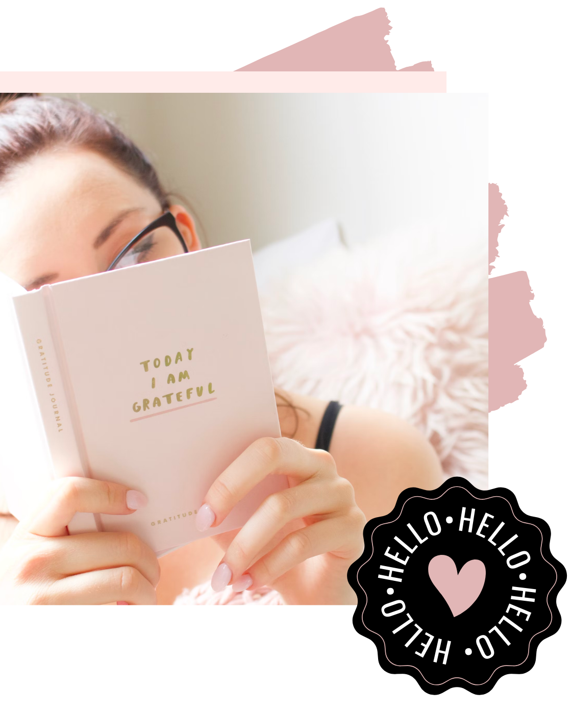Person holding a pink notebook with 'Today I am grateful' text, wearing glasses, on a white background with 'HELLO' logo.