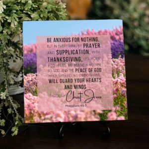 floral inspirational ceramic tile against greenery