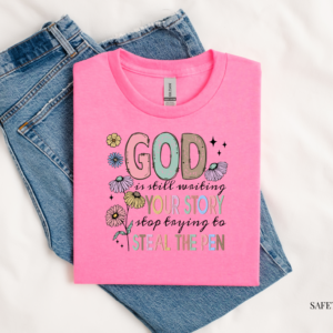 pink t shirt with inspirational writing on white background