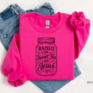 pink t shirt with inspirational writing on white background