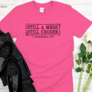 words on pink tshirt against white background