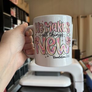 white coffee cup with inspirational words against indoor background