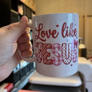 white coffee cup with inspirational words against indoor background